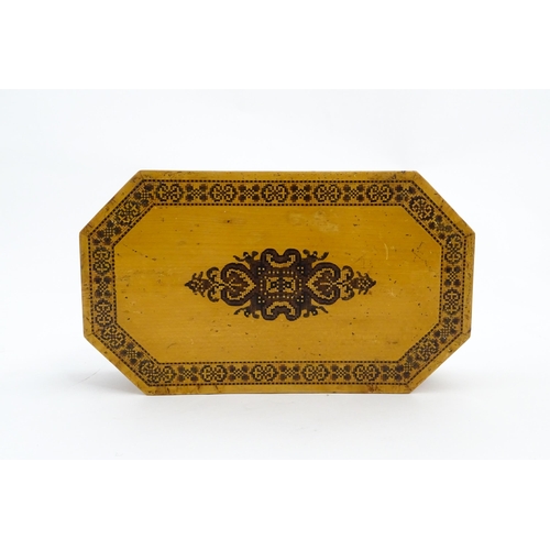 1062 - A 19thC Tunbridge ware games box of octagonal form with banded decoration, opening to reveal four se... 