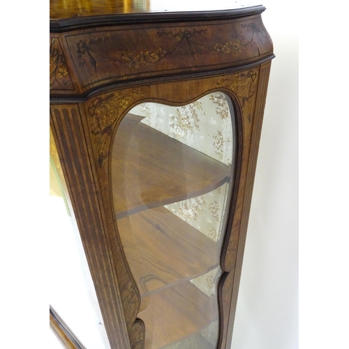 1574 - A late 19thC satinwood bookcase with a profusely inlaid frame with satinwood, box wood and fruit woo... 