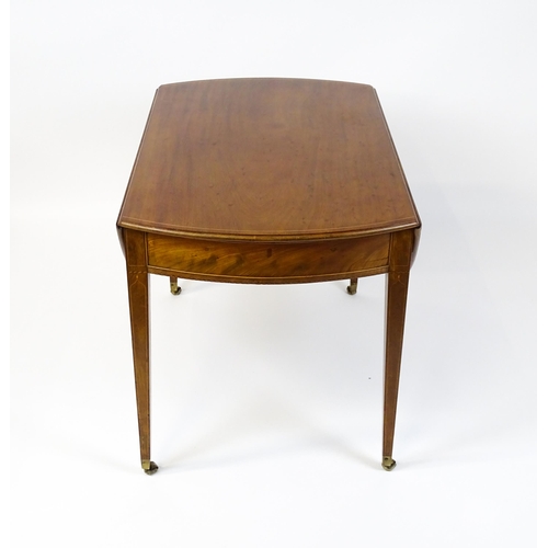 1577 - An early 19thC mahogany Pembroke table with a satinwood strung top above a single frieze drawer rais... 