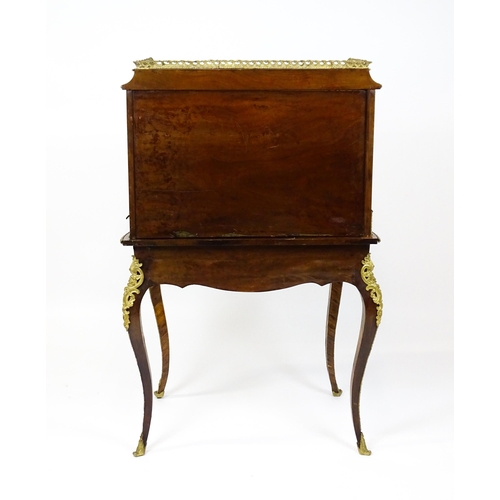 1582 - A 19thC kingwood Bonheur du jour surmounted by a brass gallery and having a profusely inlaid frame, ... 