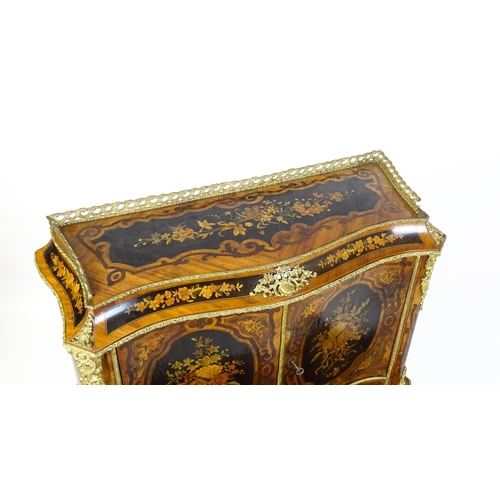 1582 - A 19thC kingwood Bonheur du jour surmounted by a brass gallery and having a profusely inlaid frame, ... 