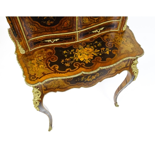 1582 - A 19thC kingwood Bonheur du jour surmounted by a brass gallery and having a profusely inlaid frame, ... 