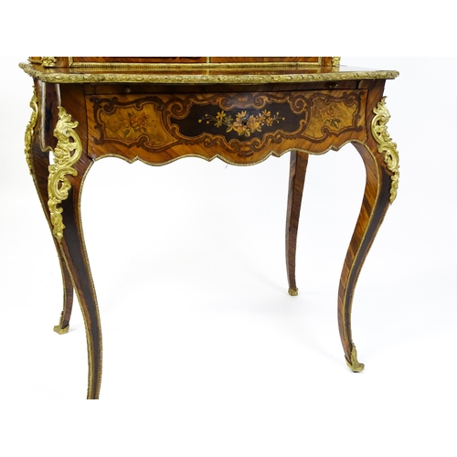 1582 - A 19thC kingwood Bonheur du jour surmounted by a brass gallery and having a profusely inlaid frame, ... 