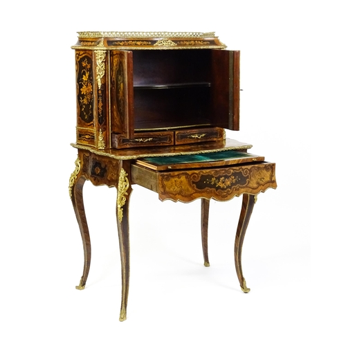 1582 - A 19thC kingwood Bonheur du jour surmounted by a brass gallery and having a profusely inlaid frame, ... 