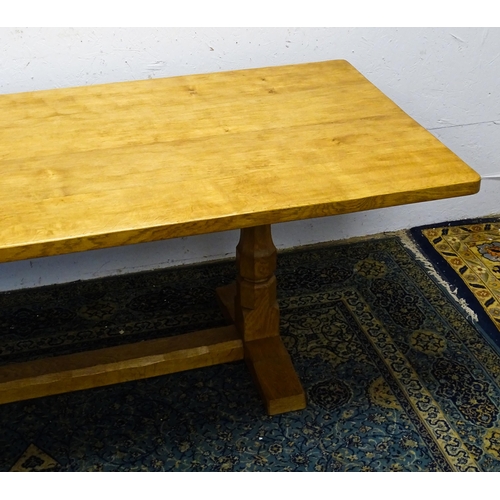 1583 - A mid to late 20thC Robert 'Mouseman' Thompson dining table. The 8ft long oak table top with an adze... 