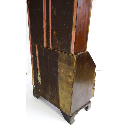 1602 - A Georgian mahogany bureau bookcase, with a moulded top above two astragal glazed doors and a fall f... 