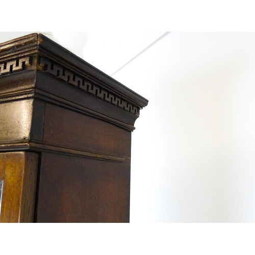 1602 - A Georgian mahogany bureau bookcase, with a moulded top above two astragal glazed doors and a fall f... 