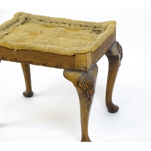 1658 - An early 20thC stool raised on four shell carved cabriole legs terminating in pad feet. 20