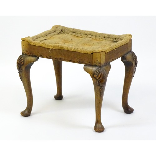 1658 - An early 20thC stool raised on four shell carved cabriole legs terminating in pad feet. 20