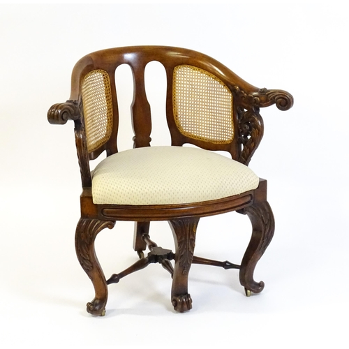 1664 - A mid 19thC mahogany Burgermeister chair, this continental chair having a bowed backrest terminating... 