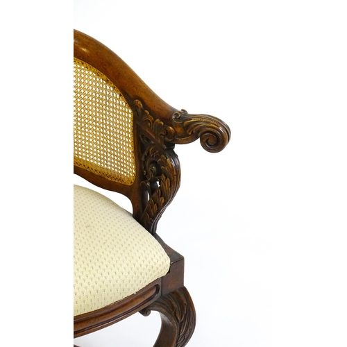 1664 - A mid 19thC mahogany Burgermeister chair, this continental chair having a bowed backrest terminating... 