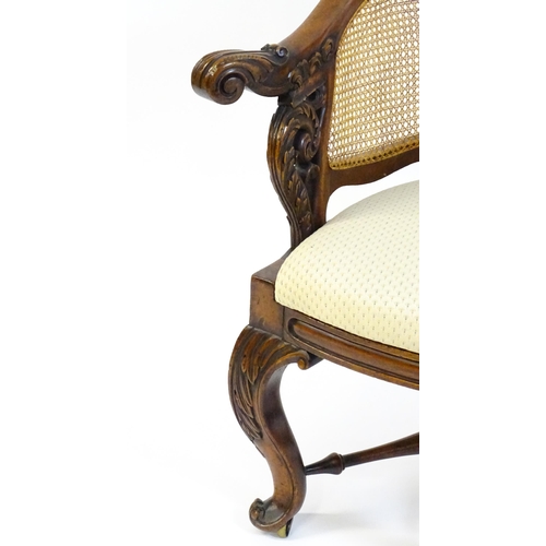 1664 - A mid 19thC mahogany Burgermeister chair, this continental chair having a bowed backrest terminating... 