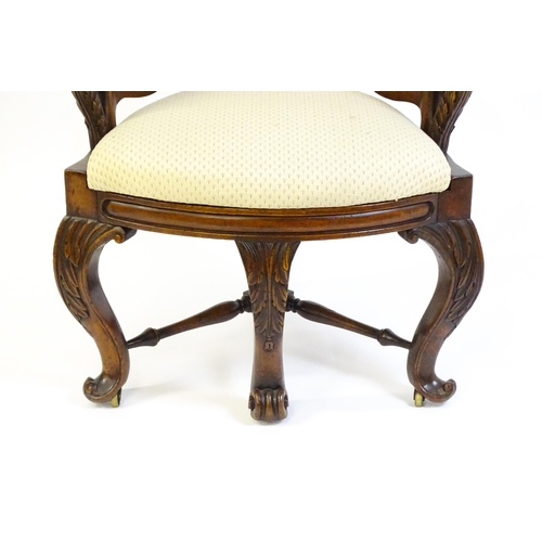 1664 - A mid 19thC mahogany Burgermeister chair, this continental chair having a bowed backrest terminating... 