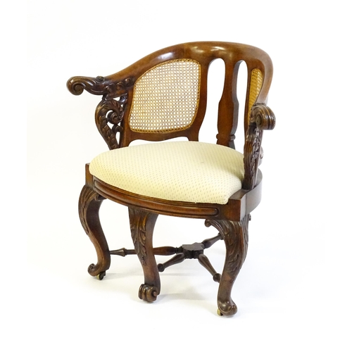 1664 - A mid 19thC mahogany Burgermeister chair, this continental chair having a bowed backrest terminating... 