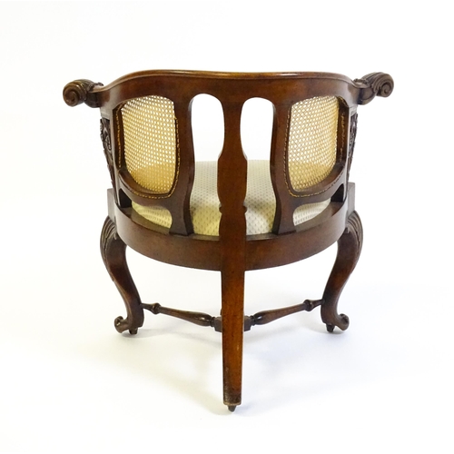 1664 - A mid 19thC mahogany Burgermeister chair, this continental chair having a bowed backrest terminating... 