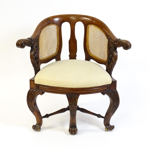 1664 - A mid 19thC mahogany Burgermeister chair, this continental chair having a bowed backrest terminating... 