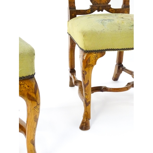 1683 - A pair of early / mid 18thC Dutch side chairs with profusely inlaid walnut frames, the satinwood mar... 