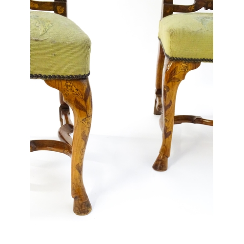 1683 - A pair of early / mid 18thC Dutch side chairs with profusely inlaid walnut frames, the satinwood mar... 