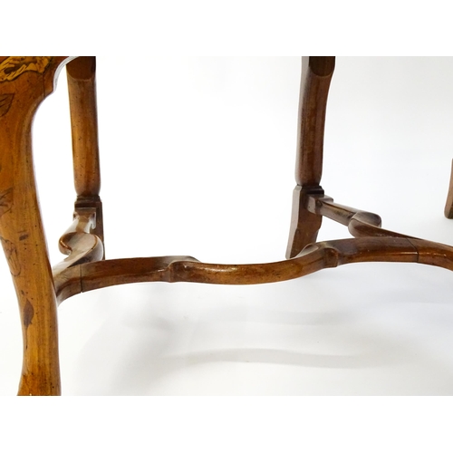 1683 - A pair of early / mid 18thC Dutch side chairs with profusely inlaid walnut frames, the satinwood mar... 