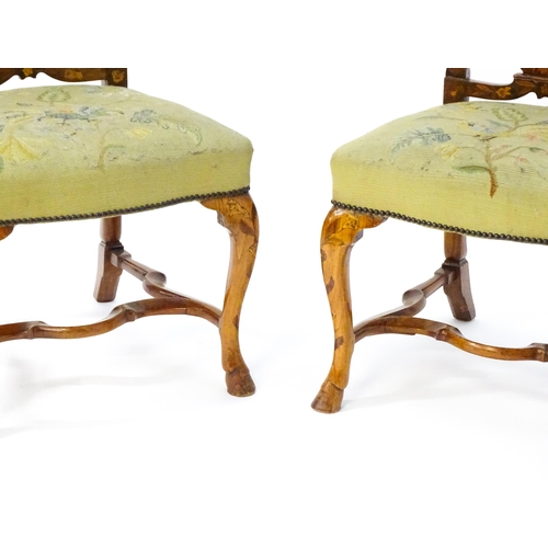 1683 - A pair of early / mid 18thC Dutch side chairs with profusely inlaid walnut frames, the satinwood mar... 