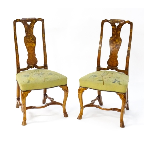 1683 - A pair of early / mid 18thC Dutch side chairs with profusely inlaid walnut frames, the satinwood mar... 