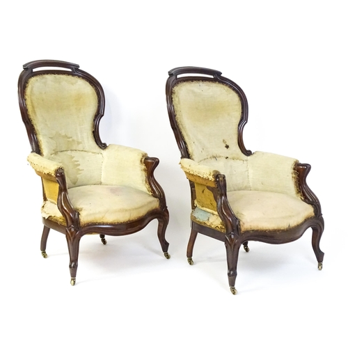 1690 - A pair of 19thC mahogany armchairs for re-upholstery, the chairs having spoon backs, manchettes and ... 