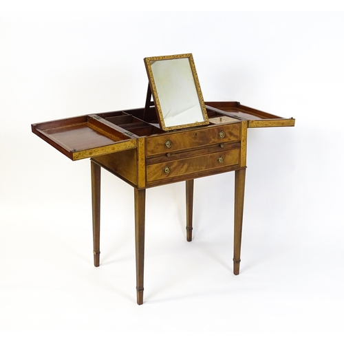 1714 - A late Georgian mahogany dressing table / vanity table with a double hinged top opening to show an i... 