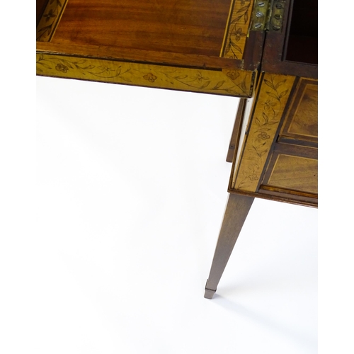 1714 - A late Georgian mahogany dressing table / vanity table with a double hinged top opening to show an i... 