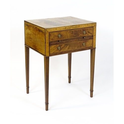 1714 - A late Georgian mahogany dressing table / vanity table with a double hinged top opening to show an i... 