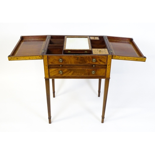 1714 - A late Georgian mahogany dressing table / vanity table with a double hinged top opening to show an i... 