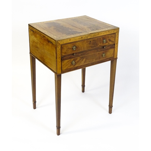 1714 - A late Georgian mahogany dressing table / vanity table with a double hinged top opening to show an i... 