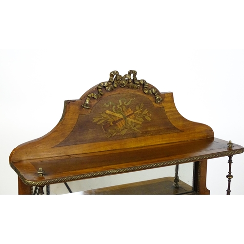 1715 - A 19thC mahogany Bonheur du jour with a shaped and mirrored upstand having marquetry decoration matc... 