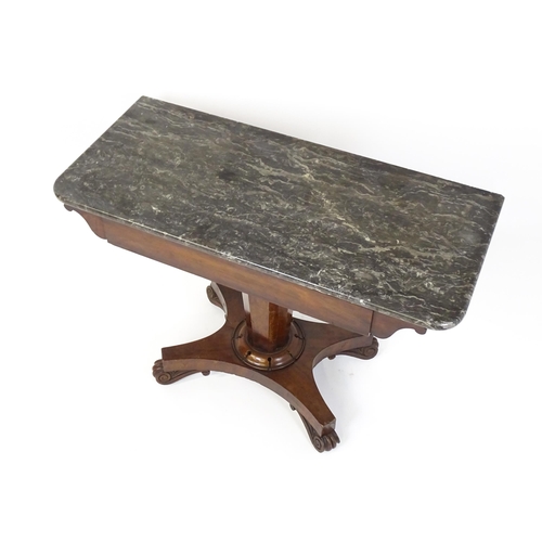 1734 - A 19thC marble topped side table with a canted pedestal above four scrolled feet. 38