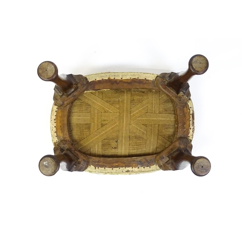 1569 - A Queen Anne stool raised on four cabriole legs terminating in pad feet. 23