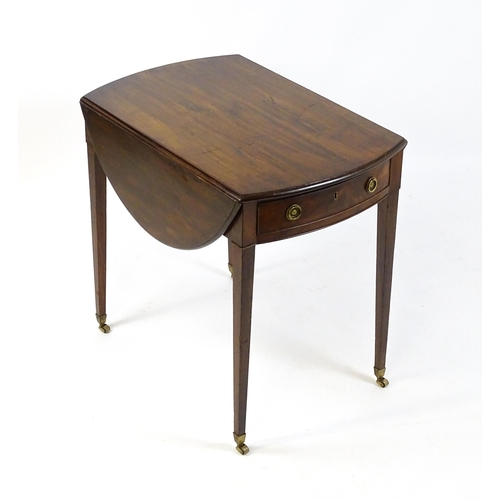 1595 - An early 19thC mahogany Pembroke table with two demi lune leaves flanking a single short drawer to o... 