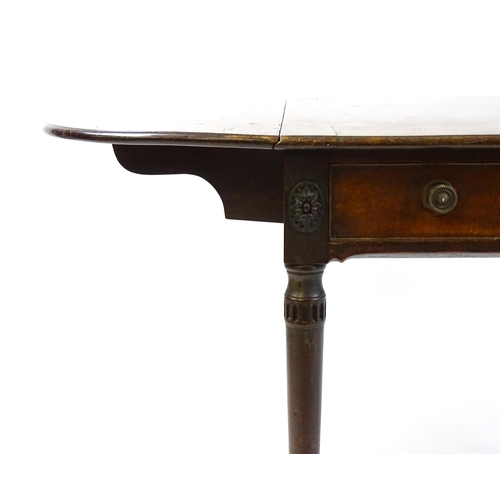 1600 - A George III mahogany Pembroke table with two demi lune leaves above a single short drawer to each e... 