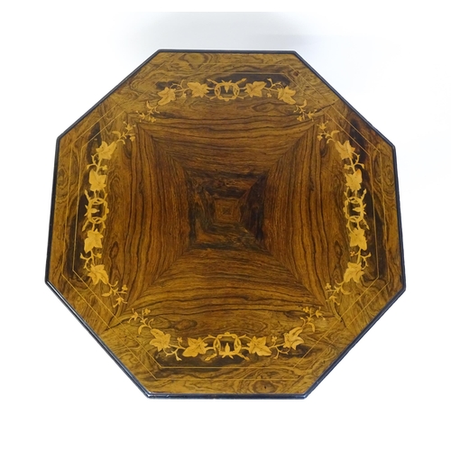 1635 - A Victorian rosewood occasional table with floral satinwood inlay above a floral marquetry inlaid un... 