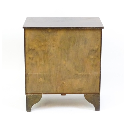 1642 - An early 20thC mahogany chest of drawers with a rectangular top above four long drawers with brass k... 