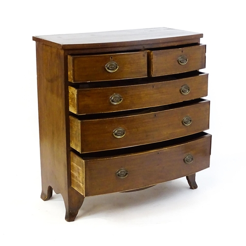 1646 - A late Victorian mahogany bow fronted chest of drawers comprising two short over three long drawers ... 