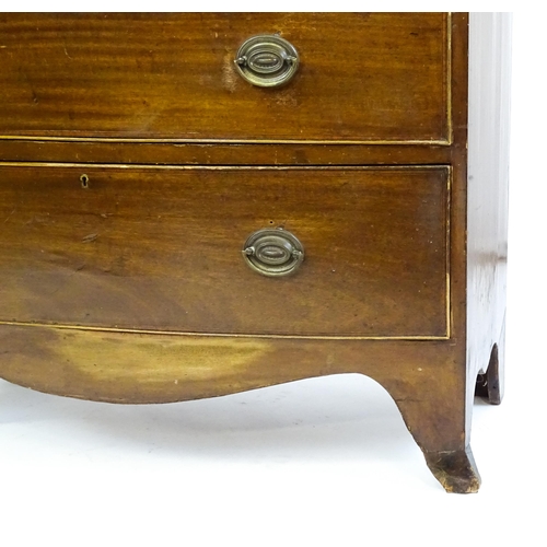 1646 - A late Victorian mahogany bow fronted chest of drawers comprising two short over three long drawers ... 