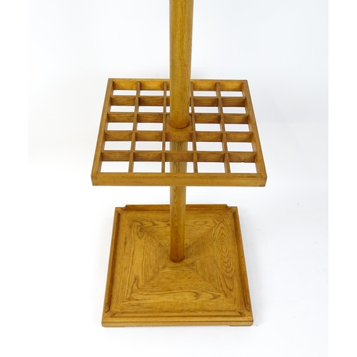 1702 - A late 20thC / early 21stC hall stand with antler coat hooks and a twenty-four section stick stand a... 