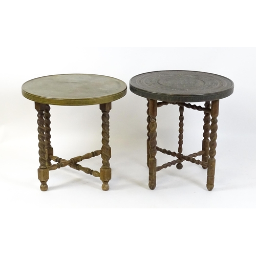 1708 - Two early / mid 20thC brass topped tables with folding bases. 23