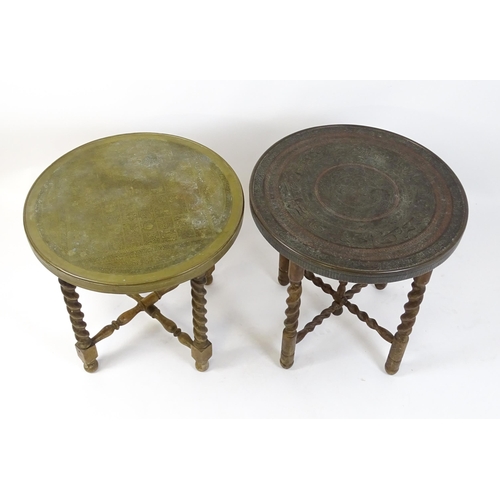 1708 - Two early / mid 20thC brass topped tables with folding bases. 23