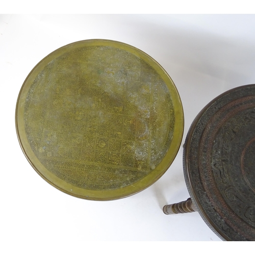 1708 - Two early / mid 20thC brass topped tables with folding bases. 23