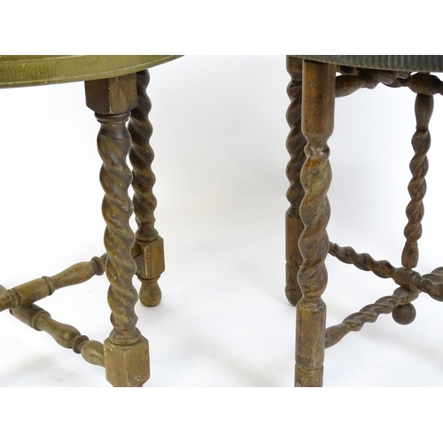 1708 - Two early / mid 20thC brass topped tables with folding bases. 23