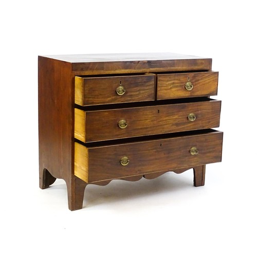 1648 - An early 19thC mahogany chest of drawers with a rectangular top above two short over two long drawer... 