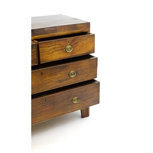 1648 - An early 19thC mahogany chest of drawers with a rectangular top above two short over two long drawer... 