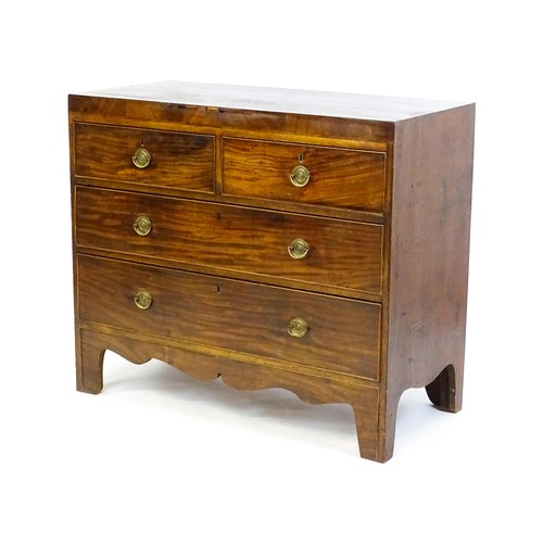 1648 - An early 19thC mahogany chest of drawers with a rectangular top above two short over two long drawer... 