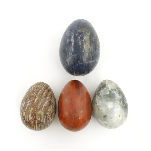 1087 - Natural History / Geology Interest: Four polished hardstone specimen eggs to include lapis lazuli, a... 