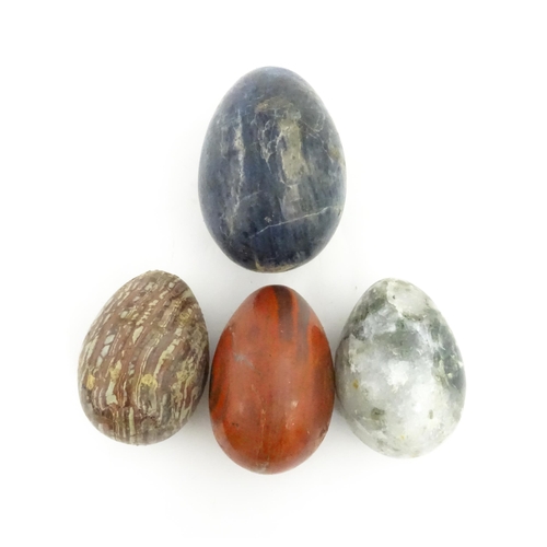 1087 - Natural History / Geology Interest: Four polished hardstone specimen eggs to include lapis lazuli, a... 